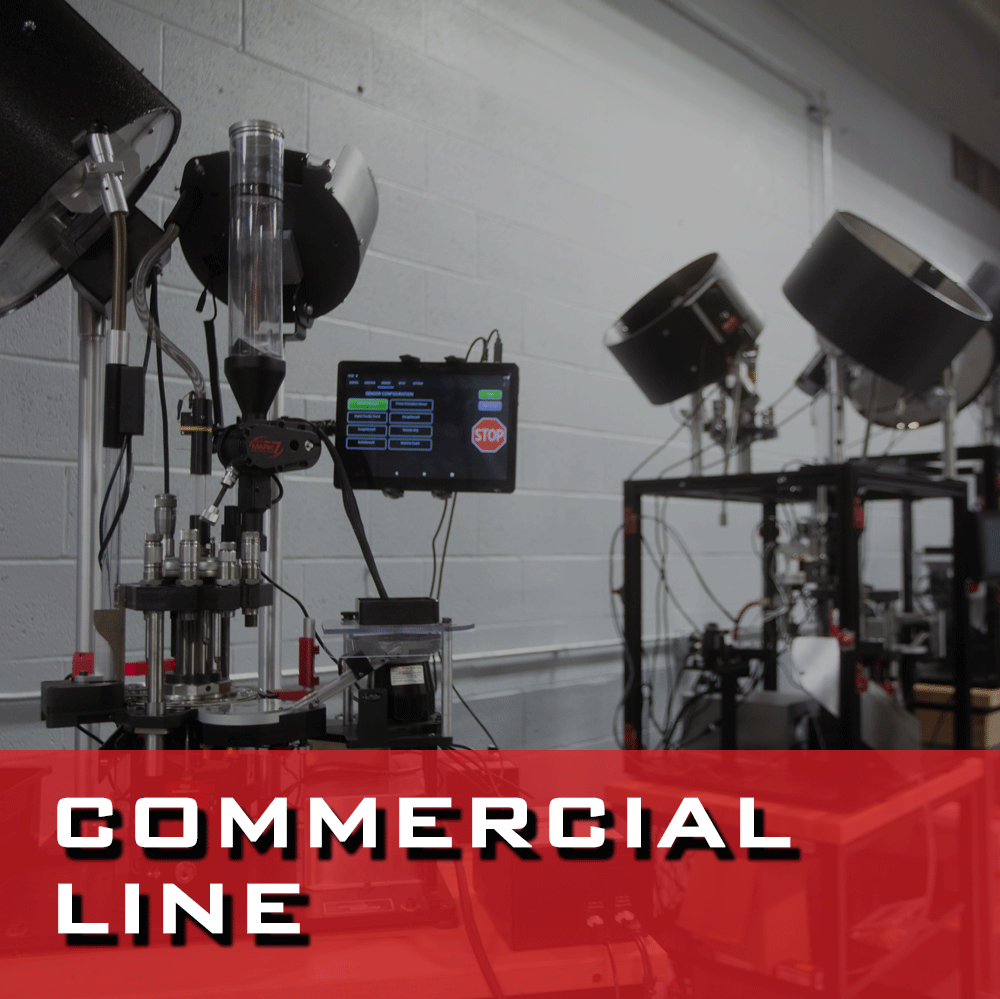 A photo display the two commercial machines provided by Mark 7, The Revolution and The Titan. The image itself links to a page comparing the two